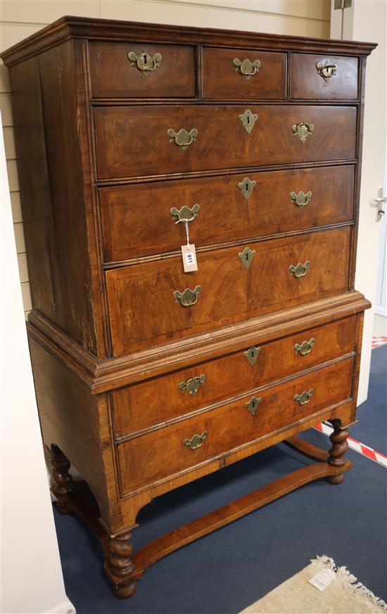 An early 18th century walnut chest on stand, 159cm high